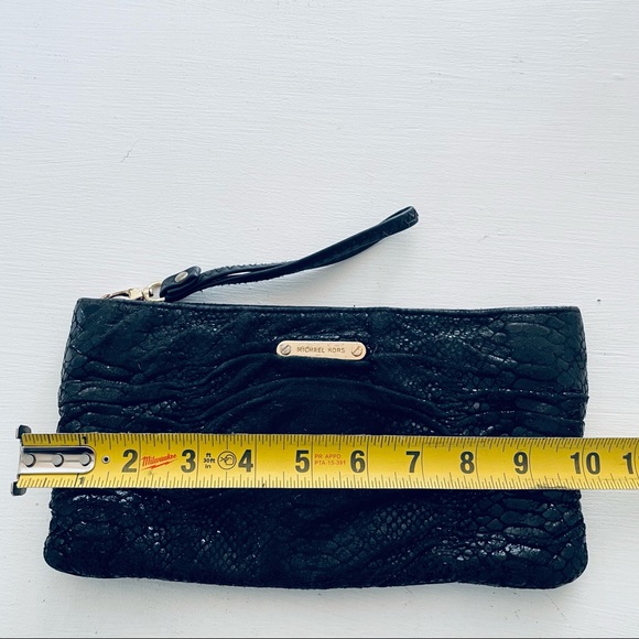 Michael Kors Black
Python Embossed
Leather Clutch - Picture 6 of 10